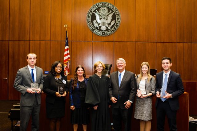 From Left to Right: Tom Severson, NU Student; Ashley Kirkwood, NU Student; Adele Rapport, Regional Co-Chair and District Director for the U.S. Department of Education; Judge Rebecca Pallmeyer, of the Northern District of Illinois; Joe Tilson, Regional Co-Chair and Co-Chair of Meckler Bulger Tilson Marick & Pearson LLP, Anne Yonover, NU Student; and Andrew Cockroft, NU Student