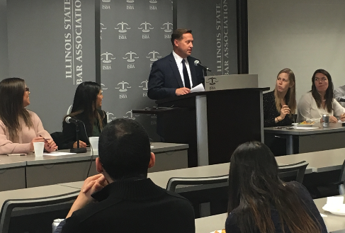 John L. Nisivaco speaks to attendees