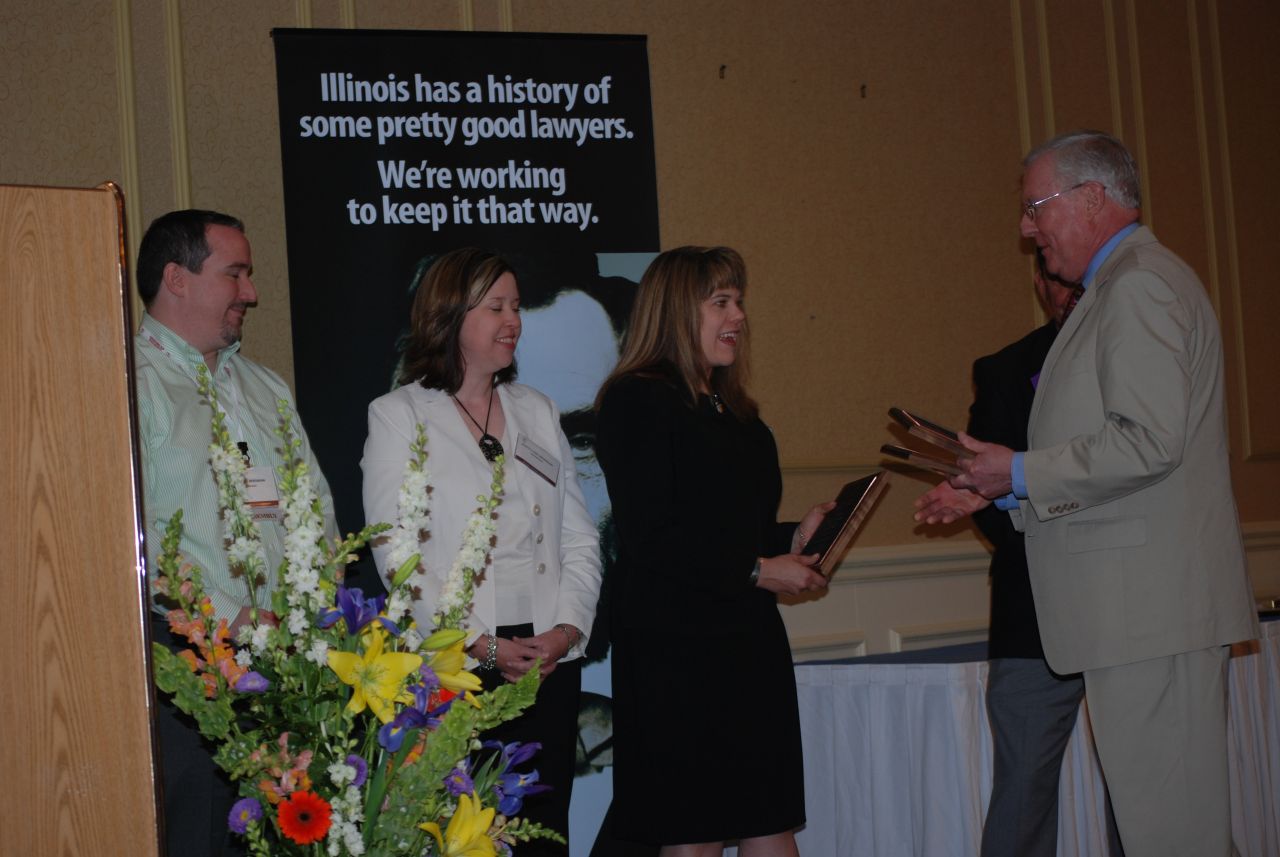 President-elect John O'Brien presents the John C. McAndrews Pro Bono Service Award