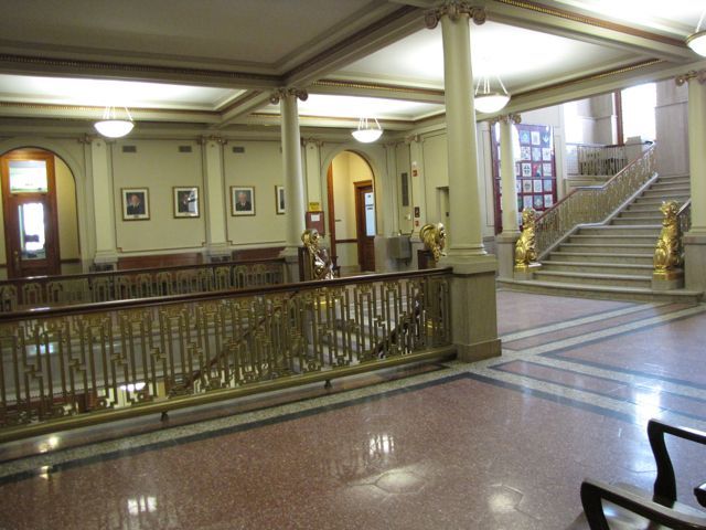 The ornate 2nd floor lobby with marble floors and four rams covered in 14K gold flanking each staircase.