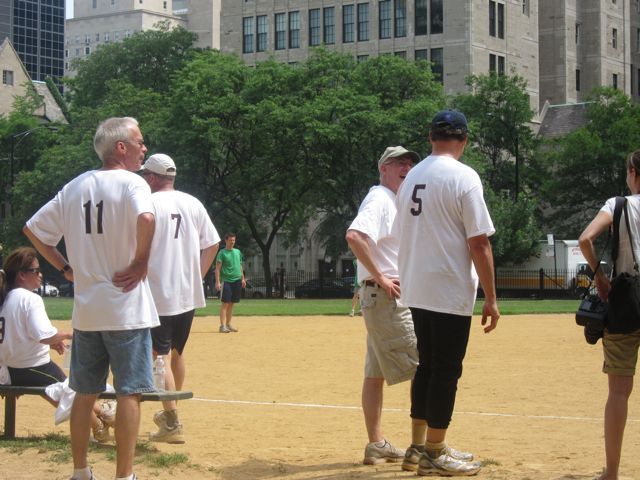 ISBA Board members talk strategy before the game.
