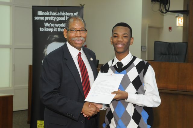 Dean Rory Smith presents a Moot Court award to David McNeal