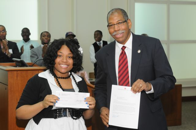 Moot Court winner Danielle Coker with John Marshall Law School Dean Rory Smith