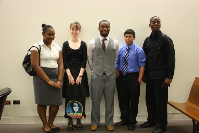 Teacher Tyrese Foreman with a group of students in the Daley Center.