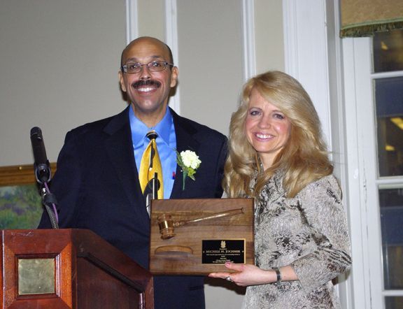Chapter Justice Pierre Priestley presents immediate Past Justice Michele Jochner with a plaque commemorating her two-year term as the Chapter's leader.