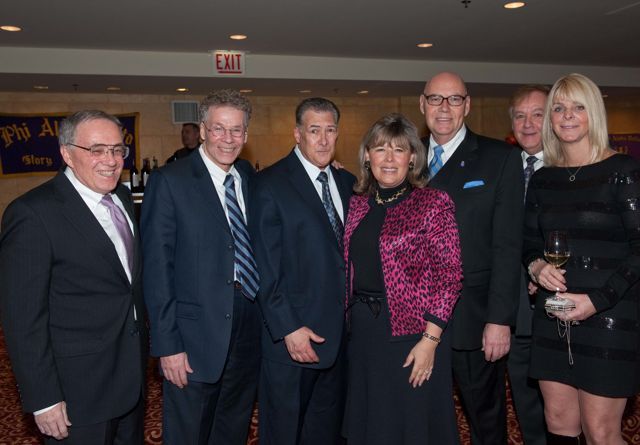 Chief Judge Holderman and ISBA 3rd Vice President Paula H. Holderman with members of the law firm of Black & Black   