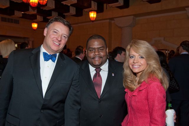 ISBA President-Elect John Locallo and Chicago Alumni Chapter Justice Michele Jochner greet a Phi Alpha Delta law student member from the NIU College of Law