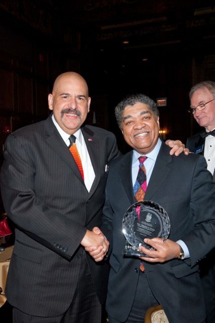 Judge William Hooks congratulates Chief Judge Evans