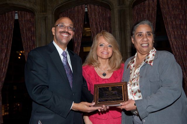 Pierre Priestley and Michele Jochner present a Chicago Alumni Chapter Centennial Award to past Chapter Justice, Hon. Julie-April Montgomery