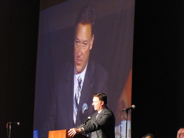 ISBA President John G. Locallo introduces award recipient Paula H. Holderman