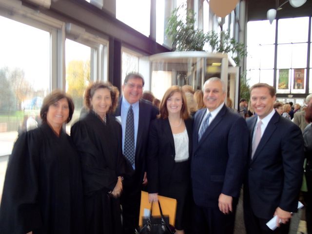 Appellate Justice Mary S. Schostok, Appellate Justice Ann Jorgensen, ISBA 2nd Vice President Richard D. Felice, new admittee Laura Maglio, her employer Sam Tornatore and ISBA Secretary John Nisivaco
