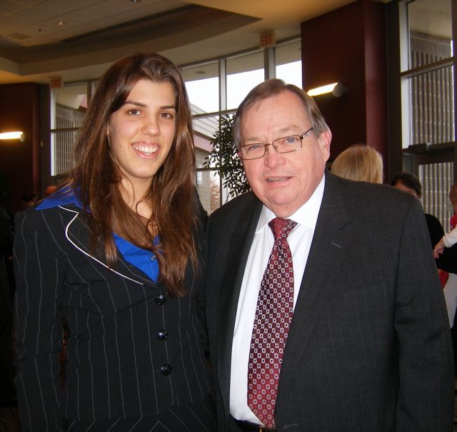ISBA Board member and 5th District ceremony speaker Russell Scott congratulates new admittee Natalie Long.