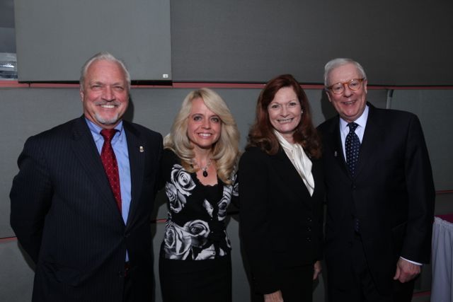 Michele Jochner, Chair of the Executive Board of the Chicago Alumni Chapter, visits with Board members Royal F. Berg, Julie Ann Sebastian, and John O'Brien, a past president of the ISBA.