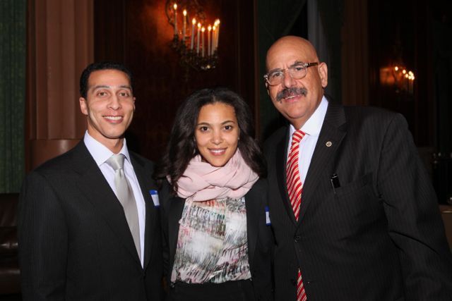 Awardee Hon. William H. Hooks (far right), is congratulated by his daughter, Ashley Hooks, and her fiance, attorney Kyle Williams. 
