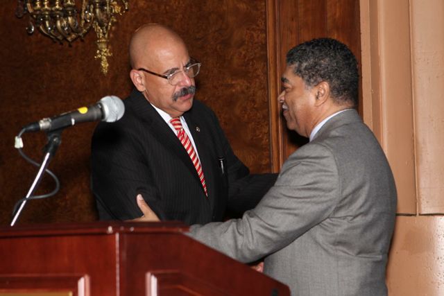 Chief Judge Timothy Evans congratulates Judge William Hooks after introducing him.