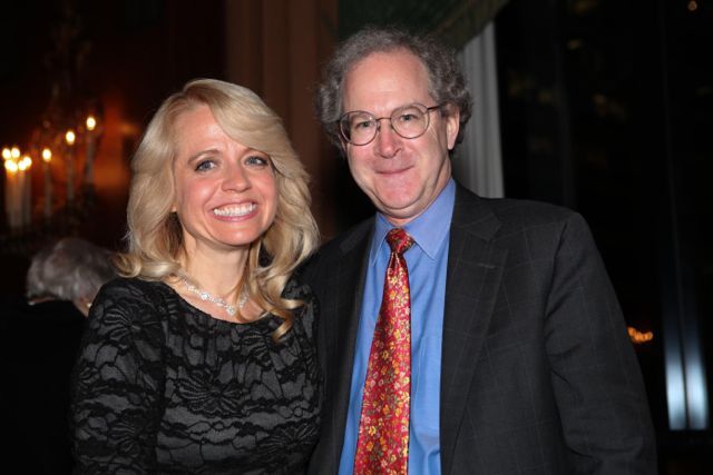Michele Jochner is congratulated by Dean Gregory Mark of DePaul University College of Law, her alma mater.