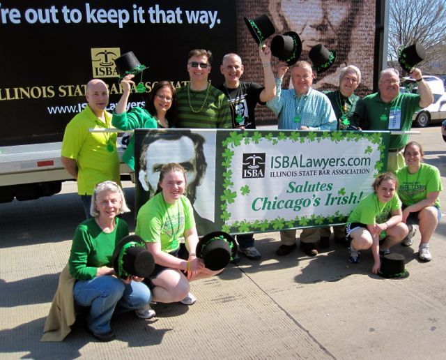 The luck of the Irish was with participants in the annual St. Patrick’s Day Parade, who enjoyed bright sunshine and record temps as they marched down Chicago’s Columbus Drive. ISBA participants included (standing, from left) Craig Somach, Kristi Vetri, ISBA President John G. Locallo, John Bailen, ISBA Board member Judge Russell Hartigan, Jim Reilly and John Murphy. Kneeling are Anne Murphy and daughters Kathleen, Maggie and Joan.