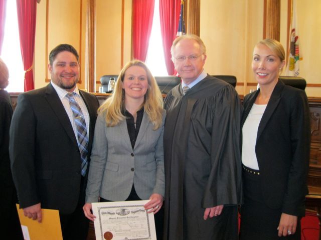 New admittee Jacob Lawson, new admittee Megan Cottington, Chief Justice Thomas L. Kilbride and speaker and ISBA Assembly member Jessica Hegarty.
