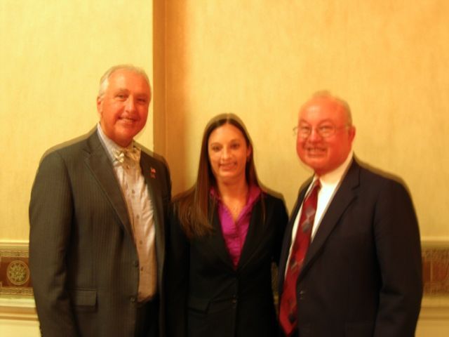 ISBA 2nd Vice President Umberto S. Davi congratulates new admittee Megan Cantlin and her father. ISBA member John (Jack) Cantlin. Megan became Jack's fifth child to be admitted to the bar.
