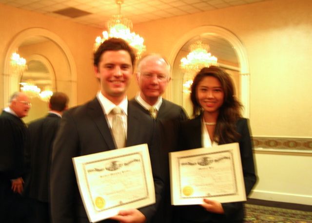 New admittees Jordan Kielian and Monica Kim with Justice Thomas L. Kilbride