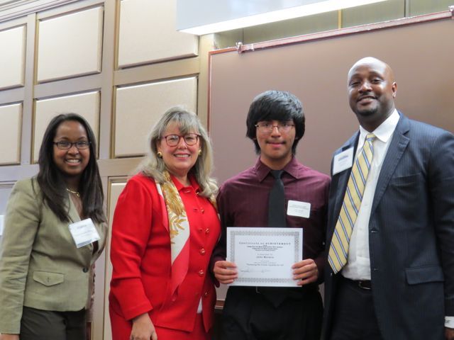 Event co-chairs Kenya Jenkins-Wright (left) and David Kadzai (right) with ISBA President-elect Paula H. Holderman and 3rd place winner John Moreno of Jane Addams High School.