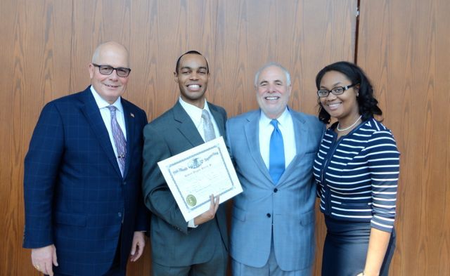 ISBA Board member James McCluskey, new admittee Robert Steele, Justice Robert Thomas and Brittney Steele.