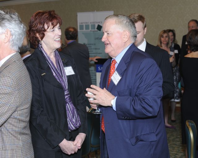 ISBA 3rd Vice President Russell Hartigan (right) and Advisory Committee Member CJ Muller