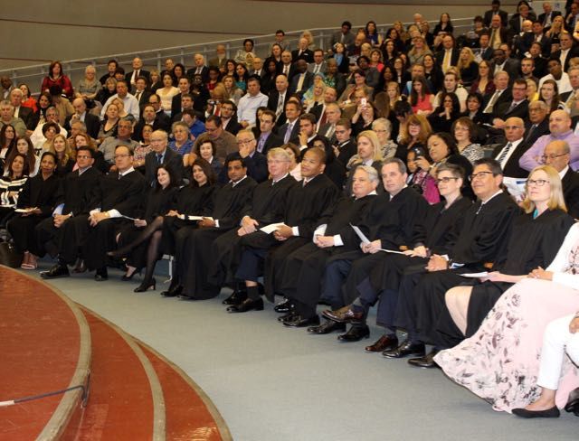 Thirteen new associate judges of the Circuit Court of Cook County prepare to be sworn in Monday, May 9, 2016, at an event held in the James R. Thompson Center. They are (from left to right): Sophia Atcherson, George L. Canellis, Jr., Vincenzo Chimera, Jean M. Cocozza, Geraldine A. D&rsquo;Souza, Mohammed M. Ghouse, Patrick J. Heneghan, Robert W. Johnson, James L. Kaplan, Marc W. Martin, Mary C. Marubio, Edward N. Robles, and Marita C. Sullivan. Chief Judge Timothy C. Evans administered the oaths of office.
