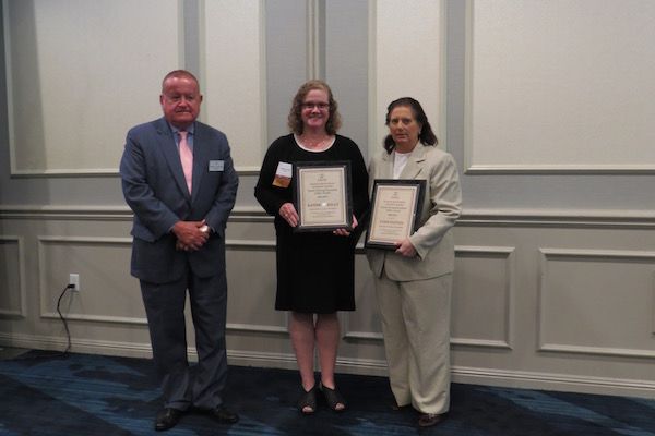 President Russell Hartigan, Kathryn Kelly, and Lynn Patton
