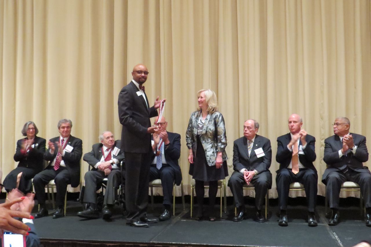 Vincent Cornelius presents Lori Levin her award
