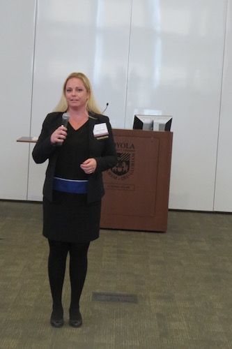 Julie Johnson delivering introductory remarks