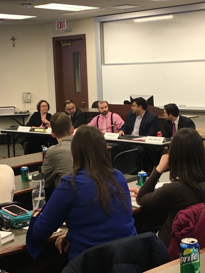 Panelists speak to an audience of law students at&nbsp;ISBA Day at Loyola University Chicago School of Law.

