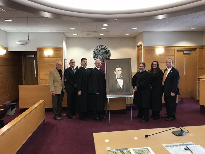 A high-quality reproduction of a famous Abraham Lincoln photograph was presented to the Montgomery County Courthouse on November 30 in Hillsboro. 
