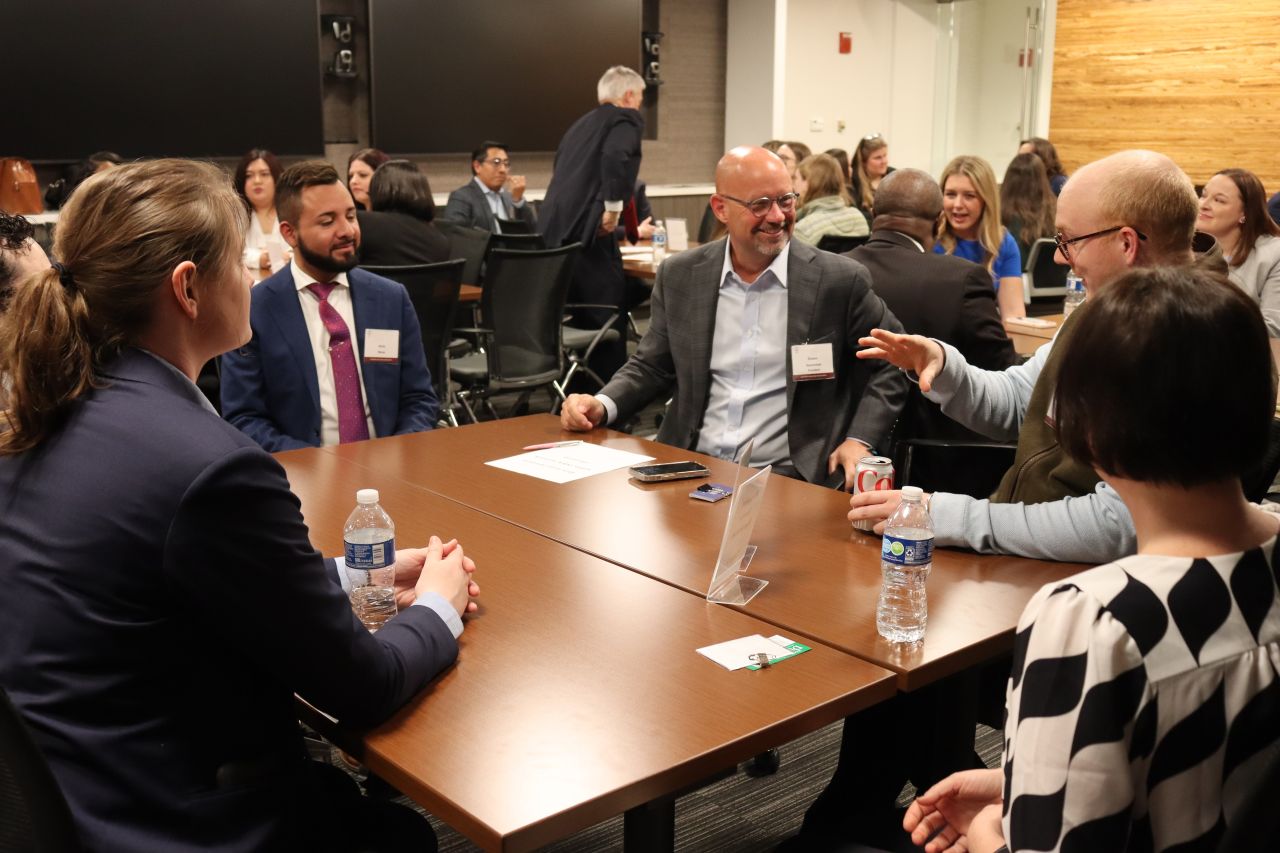 President Shawn Kasserman speaks to young lawyers and law students during Speed Networking