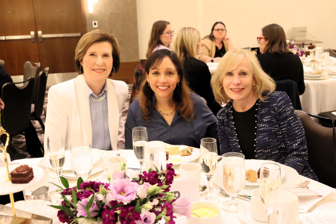 keynote speaker Justice Elizabeth Rochford with her two clerks