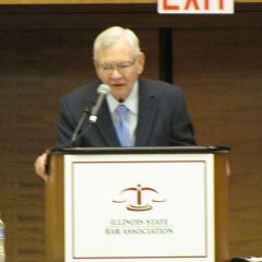 Supreme Court Chief Judge Thomas Fitzgerald addresses the Assembly