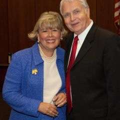 New initiate Paula Holderman is congratulated by Bob Downs