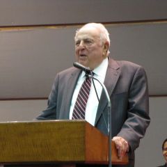 Abner Mikva spoke on behalf of Justice Theis