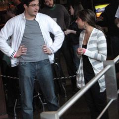 Two opponents get ready to square off at bags