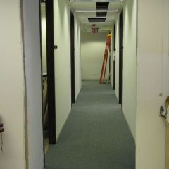 This hole was cut to provide access into previously unused space that will serve as temporary offices for ISBA staff during Phase 2.