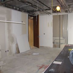 The library/conference room has been slightly enlarged by removing the old shelving and wired for a video monitor for use during meetings.