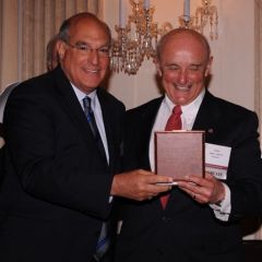 Laureate Gino L. DiVito receives his medal
