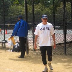ISBA President John Locallo takes his turn at bat