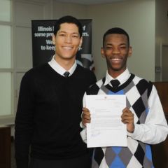 Teacher Phillip Rutherford presents the Leadership Award to David McNeal