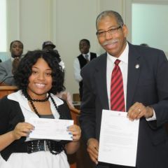 Moot Court winner Danielle Coker with John Marshall Law School Dean Rory Smith