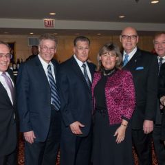Chief Judge Holderman and ISBA 3rd Vice President Paula H. Holderman with members of the law firm of Black & Black   