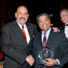 Judge William Hooks congratulates Chief Judge Evans