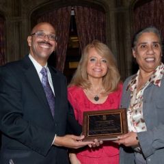 Pierre Priestley and Michele Jochner present a Chicago Alumni Chapter Centennial Award to past Chapter Justice, Hon. Julie-April Montgomery