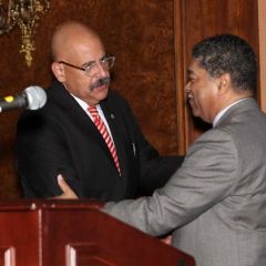 Chief Judge Timothy Evans congratulates Judge William Hooks after introducing him.