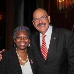  Mary Melchor congratulates Judge William Hooks.